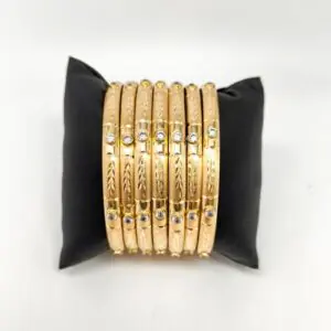 ORO NUEVO 18KT Semanario tallado con circonitas