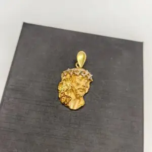 Colgante Cabeza Cristo tallada Oro bicolor 18kt